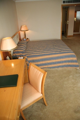Imagen de la habitación del Hotel Guo An - Beijing. Foto 9