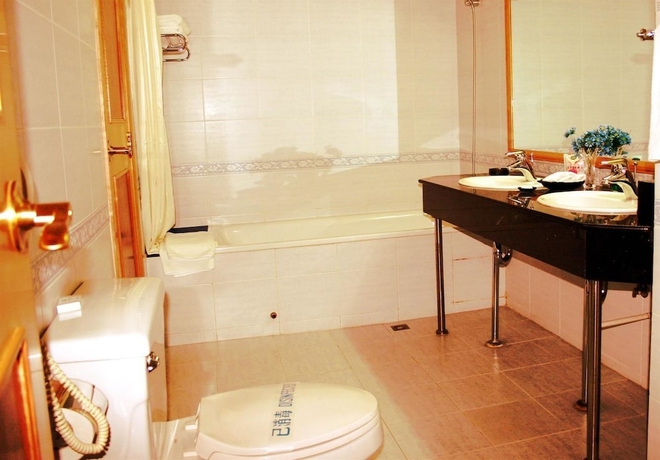 Imagen de la habitación del Hotel Guo An - Beijing. Foto 12