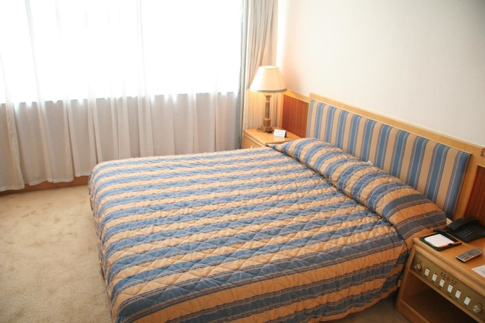 Imagen de la habitación del Hotel Guo An - Beijing. Foto 14
