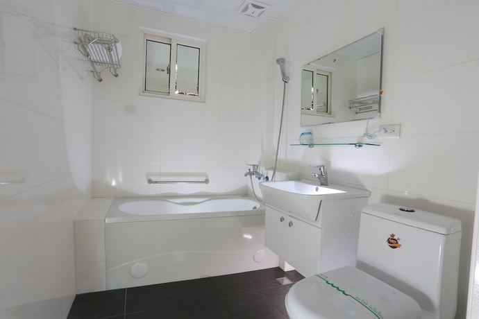 Imagen de la habitación del Hotel Guo Chen. Foto 5