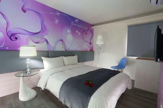 Imagen de la habitación del Hotel Guo Chen. Foto 13