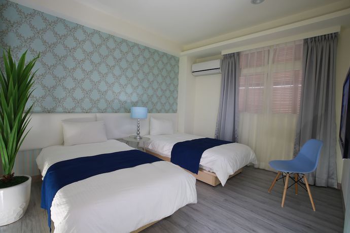 Imagen de la habitación del Hotel Guo Chen. Foto 14