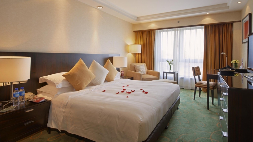 Imagen de la habitación del Hotel Guo Ji Yi Yuan. Foto 8