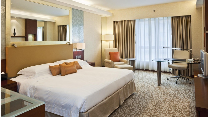 Imagen de la habitación del Hotel Guo Ji Yi Yuan. Foto 9