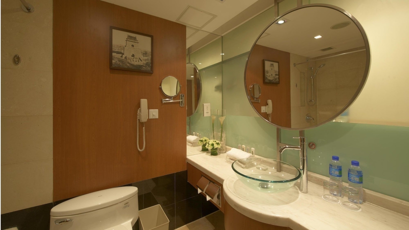 Imagen de la habitación del Hotel Guo Ji Yi Yuan. Foto 12