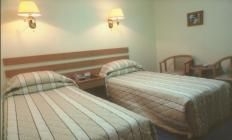Imagen de la habitación del Hotel Guoren. Foto 2