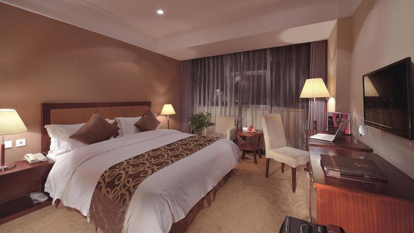 Imagen de la habitación del Hotel Guosheng. Foto 7