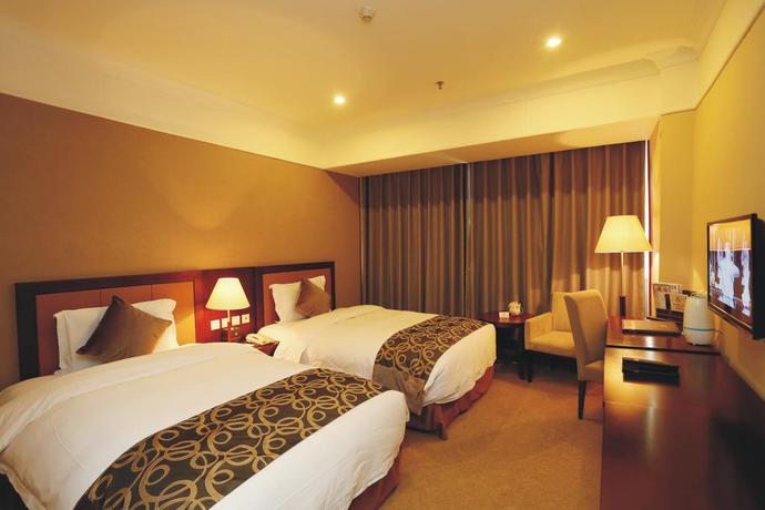 Imagen de la habitación del Hotel Guosheng. Foto 10