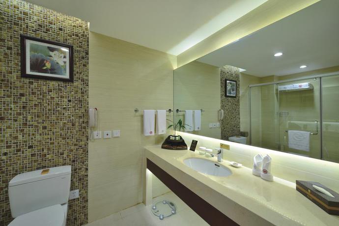 Imagen de la habitación del Hotel Guosheng. Foto 12