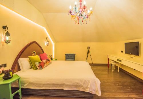 Imagen general del Hotel Guowang Hezi Resort House. Foto 2