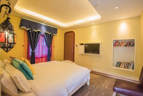 Imagen general del Hotel Guowang Hezi Resort House. Foto 3