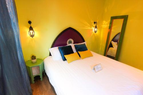 Imagen de la habitación del Hotel Guowang Hezi Resort House. Foto 7