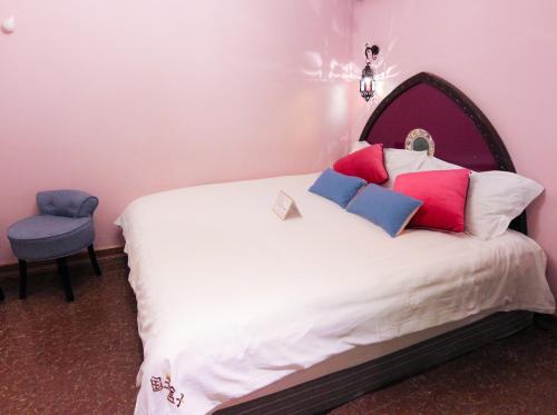 Imagen de la habitación del Hotel Guowang Hezi Resort House. Foto 9