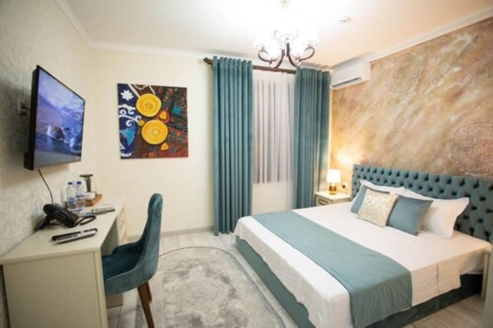 Imagen de la habitación del Hotel Gur Emir Palace. Foto 4