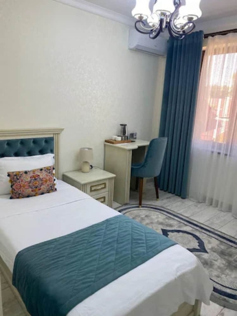 Imagen de la habitación del Hotel Gur Emir Palace. Foto 5