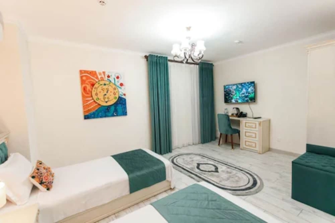 Imagen de la habitación del Hotel Gur Emir Palace. Foto 7