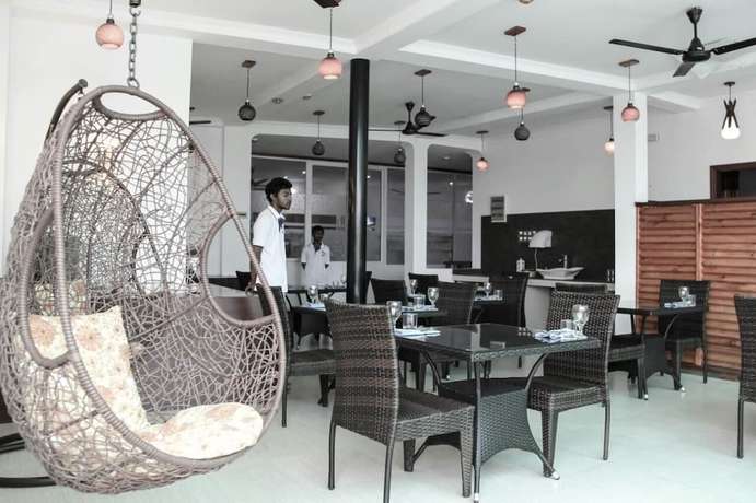 Imagen del bar/restaurante del Hotel Guraidhoo Palm Inn. Foto 3