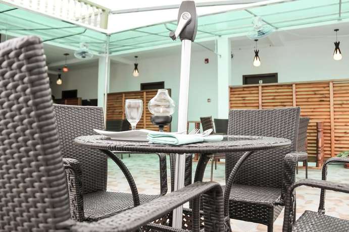 Imagen del bar/restaurante del Hotel Guraidhoo Palm Inn. Foto 8