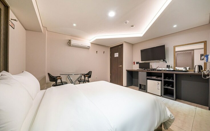 Imagen de la habitación del Hotel Guri Boutique Yeogi. Foto 14