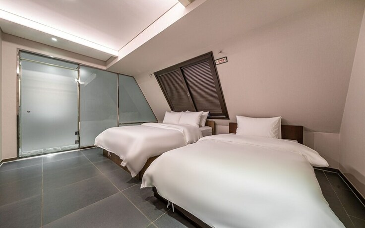 Imagen de la habitación del Hotel Guri Boutique Yeogi. Foto 28