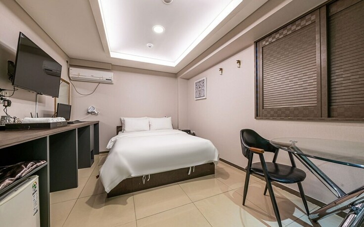 Imagen de la habitación del Hotel Guri Boutique Yeogi. Foto 29