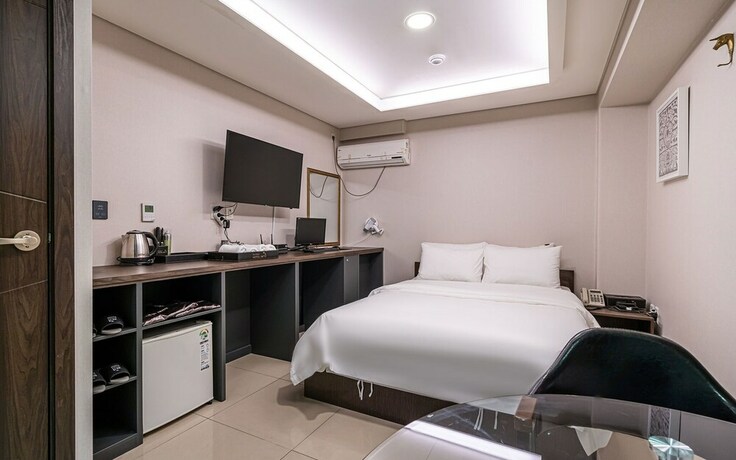 Imagen de la habitación del Hotel Guri Boutique Yeogi. Foto 31