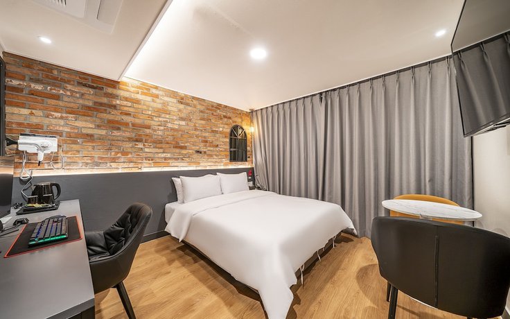 Imagen de la habitación del Hotel Guri Studio 9. Foto 12