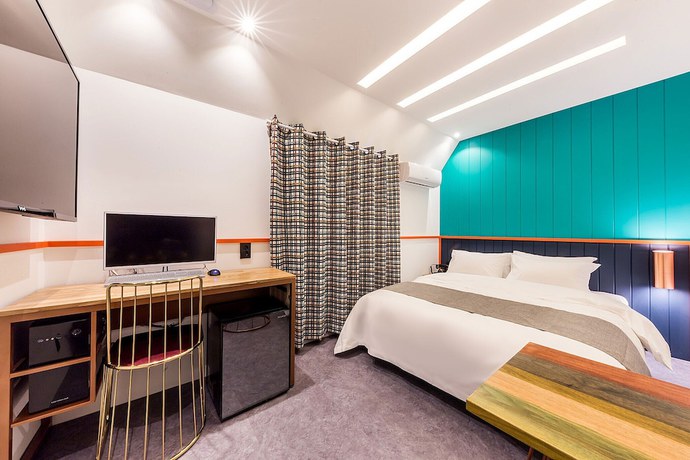 Imagen de la habitación del Hotel Guri in Cafe. Foto 10