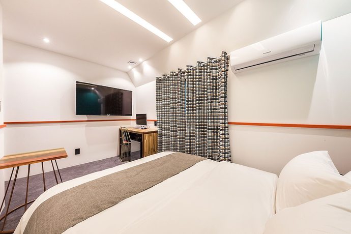 Imagen de la habitación del Hotel Guri in Cafe. Foto 14