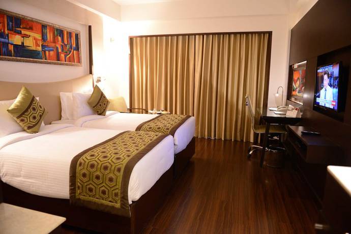 Imagen de la habitación del Hotel Gurmon Hotels Sohna Road Gurugram, a member of Radisson Individuals. Foto 3