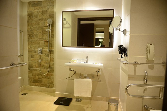 Imagen de la habitación del Hotel Gurmon Hotels Sohna Road Gurugram, a member of Radisson Individuals. Foto 4
