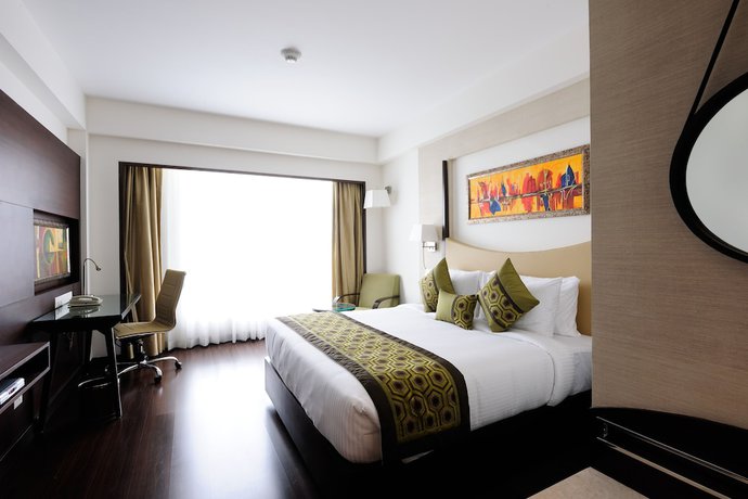 Imagen de la habitación del Hotel Gurmon Hotels Sohna Road Gurugram, a member of Radisson Individuals. Foto 5