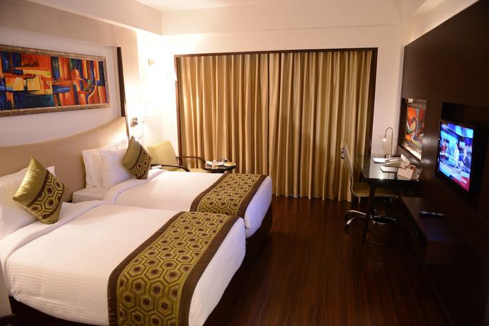 Imagen de la habitación del Hotel Gurmon Hotels Sohna Road Gurugram, a member of Radisson Individuals. Foto 7