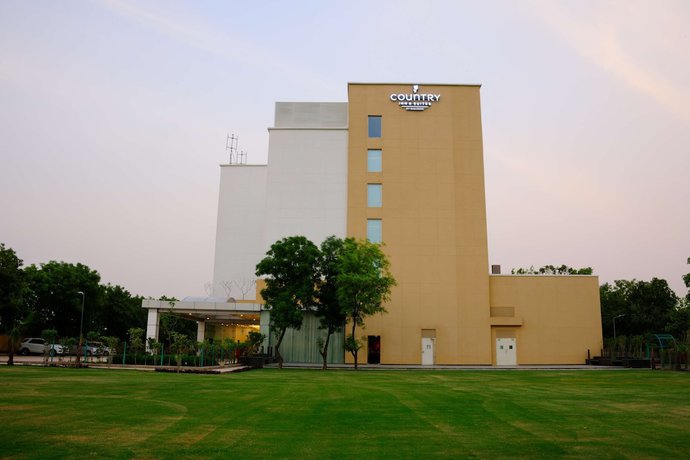 Imagen general del Hotel Gurmon Hotels Sohna Road Gurugram, a member of Radisson Individuals. Foto 1
