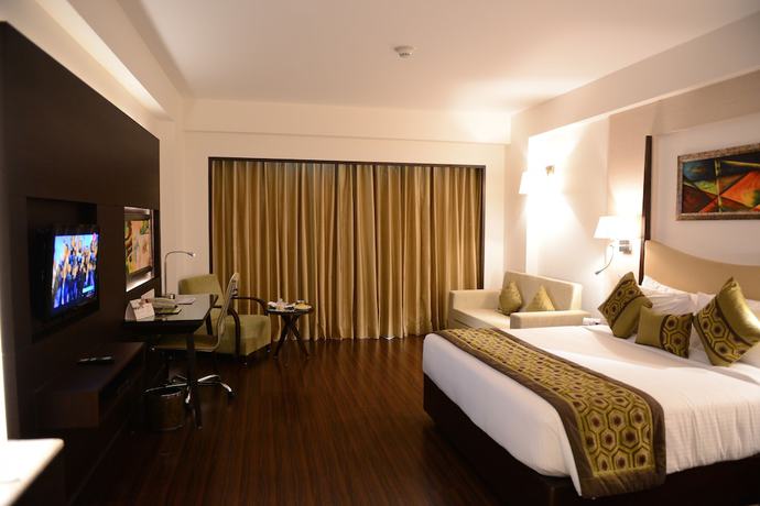 Imagen de la habitación del Hotel Gurmon Hotels Sohna Road Gurugram, a member of Radisson Individuals. Foto 8