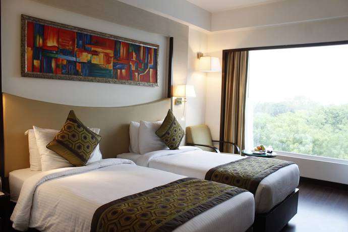 Imagen de la habitación del Hotel Gurmon Hotels Sohna Road Gurugram, a member of Radisson Individuals. Foto 9