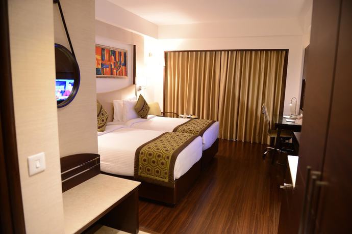 Imagen de la habitación del Hotel Gurmon Hotels Sohna Road Gurugram, a member of Radisson Individuals. Foto 10