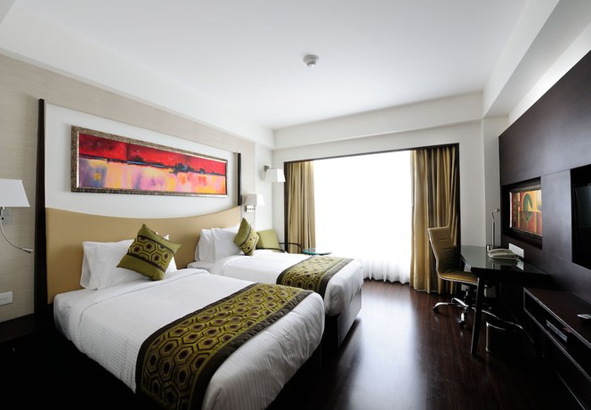 Imagen de la habitación del Hotel Gurmon Hotels Sohna Road Gurugram, a member of Radisson Individuals. Foto 11