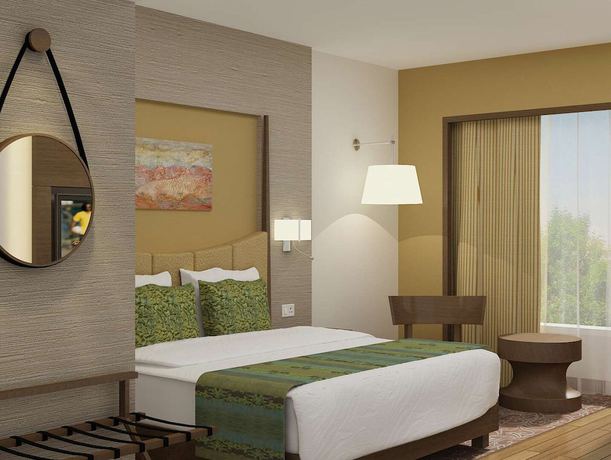 Imagen de la habitación del Hotel Gurmon Hotels Sohna Road Gurugram, a member of Radisson Individuals. Foto 16