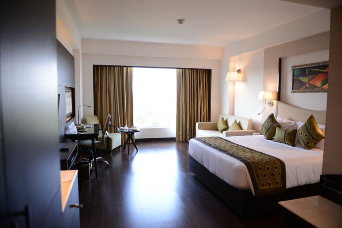 Imagen de la habitación del Hotel Gurmon Hotels Sohna Road Gurugram, a member of Radisson Individuals. Foto 17