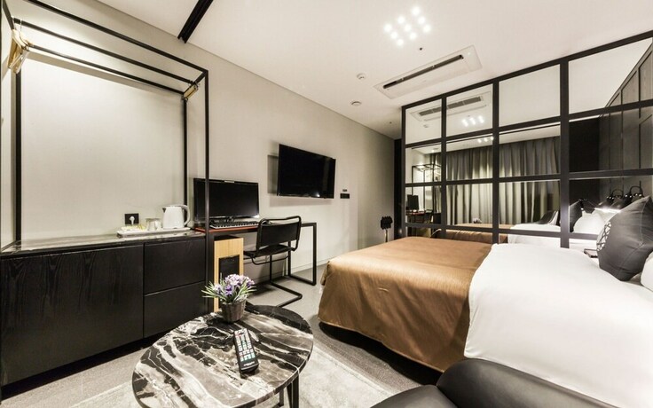 Imagen de la habitación del Hotel Guro Cullinan. Foto 13