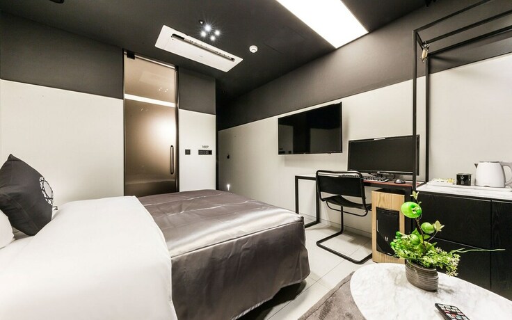 Imagen de la habitación del Hotel Guro Cullinan. Foto 33