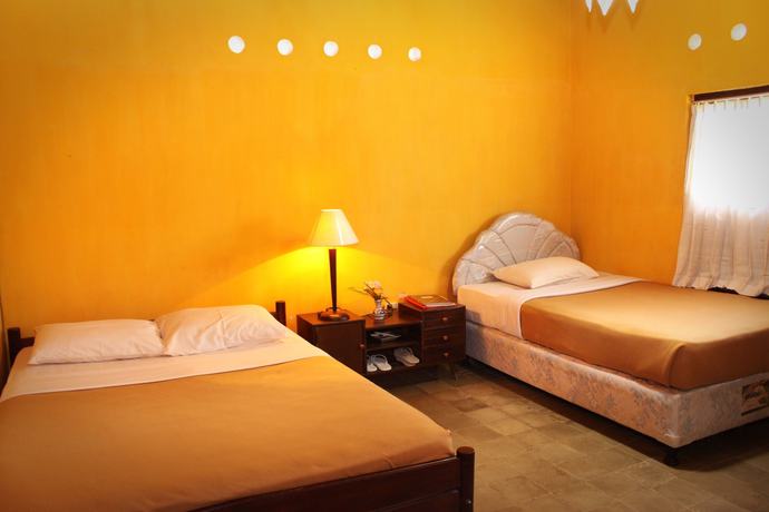Imagen de la habitación del Hotel Guru Ratna Homestay. Foto 13