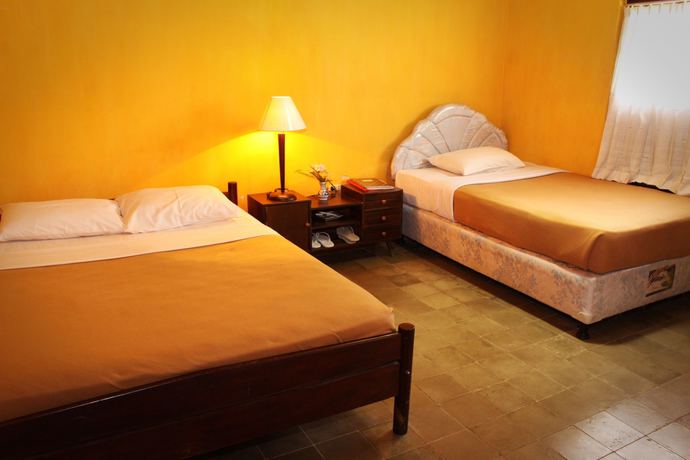 Imagen de la habitación del Hotel Guru Ratna Homestay. Foto 17