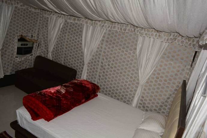 Imagen de la habitación del Hotel Gurugram Resort. Foto 18