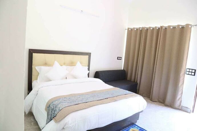 Imagen de la habitación del Hotel Gurugram Resort. Foto 19