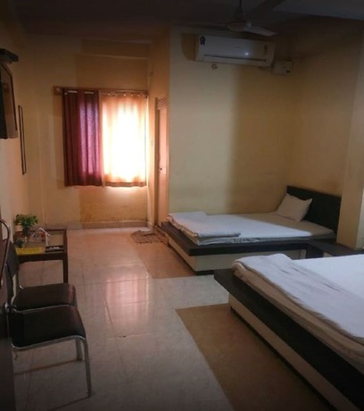 Imagen de la habitación del Hotel Gurukripa Inn. Foto 7