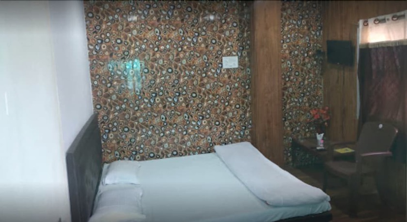 Imagen de la habitación del Hotel Gurukripa Inn. Foto 8
