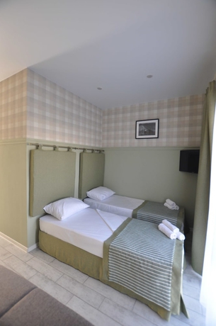 Imagen de la habitación del Hotel Gus House. Foto 7