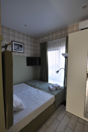 Imagen de la habitación del Hotel Gus House. Foto 11